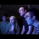 Watch a Room Full of People Cheer on a Giant Video Game Snail
